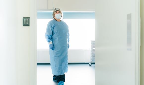 Medical Staff wearing PPE in a doorway